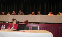 Laura Aivaliotis, Recording Secretary and Board members get ready for the Deliberative Session.